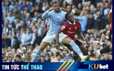 Kyle Walker (áo xanh) trong một pha tranh chấp với Manacia của Man Utd (áo đỏ)